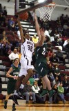 Bowman Academy's Jamie Rutherford shoots over Lacrosse's Ryan Pahl