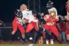 Andrean's Mark Dravet, 8, attempts to tackle