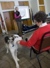 Three-time Iditarod musher, dog, visit students