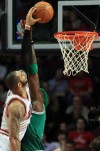 Bulls rally late without Rose to bump off Boston