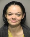 Police: Woman with distinct style arrested after shoplifting