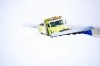 Snow plows work to clear the snow
