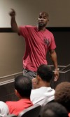 Antwaan Randle El addresses players during a football training camp