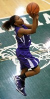Merrillville's Audrianna Downs shoots a layup against Warsaw on Saturday.