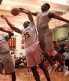 Thornwood senior Khapri Alston is fouled by T.F. South senior Kaleb Garret