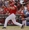 Reds rally vs Marmol, beat Cubs 4-3 in 10 innings
