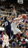 Crown Point's Thomas Bardeson shoots around Michigan City's Ryan Taylor on Thursday night.