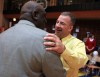 Former St. Francis de Sales basketball coach Larry Moore gets a hug