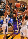 T.F. North's Montero Rice tries to shoot around the Brooks defense 