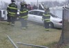 87-year-old woman rescued after car drives into pond
