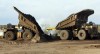 Dump trucks on oil sands surface mining site