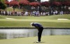 Tiger Woods reacts