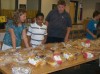 Storm can't deter families from sharing loaves with shelter