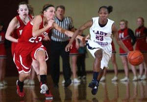 L.C. holds off West Side; E.C. Central keeps title defense alive