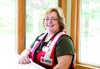 Former suburban woman volunteers in Newtown