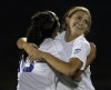 Lake Central's Jane Gates is congratulated by teammate Ceci Urquiza