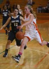 Bishop Noll's Julia Kusiak guards Wheeler's Shannon Eden
