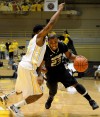 AL HAMNIK: Oakland's Reggie Hamilton puts NBA dream on hold