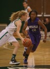 Valparaiso's Grace Withrow is guarded by Merrillville's A.J. Downs on Thursday.