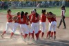 Andrean players rush the diamond