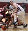 Indiana University Northwest's Matthew Edmonds grabs a loose ball