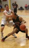 Pioneer's Brandon Scruggs guards 21st Century's Myrin Kirksey