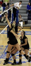 Lake Central's Victoria Gardenhire tips one over