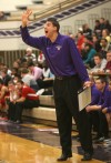 Merrillville coach T.J. Lux barks out orders during Friday's game against Portage.
