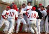 Crown Point players mob pitcher Zach Plesac
