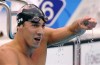 Phelps wins 7th gold by 0.01 seconds