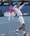 Strike a pose: Serena shows Novak how it's done
