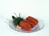 Egg croquette and garnish on plate, close-up
