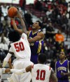 T.F. North's Montero Rice shoots over 
