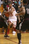 E.C. Central's Jeremiah Ochoa looks for some help against Bowman Academy on Tuesday night.