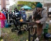 Buckely Homestead festivalgoers show pioneer spirit by attending in downpour