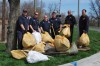 Lansing firefighters help clean up around town