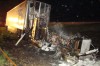 Semi slams parked car into two people on I-65