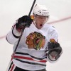 Blackhawks rout Canucks to cut deficit to 3-2