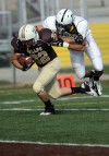 Valparaiso's Ryan Lehr gets pulled down