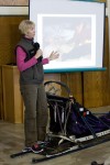 Three-time Iditarod musher, dog, visit students