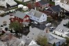 Dozens dead, millions without power in Sandy's wake