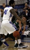 Valparaiso's Tyler Doane passes the ball around Lake Central's Tyler Wideman
