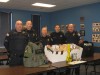 SWAT team arrests five in raid