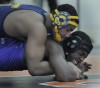 Thornwood's Kendall Nelson wrestles Thornton's Jamurul Clark 