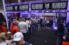 Fans line up outside the booth of apparel company Headrush to meet Eddie Wineland