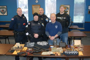 Portage police arrest four during drug raid