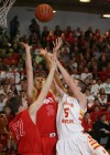 Munster's Drew Hackett and Nate Bubash battle Andrean's Daniel Keilman for a rebound