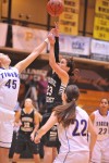 Purdue Calumet's Amanda Gaskin shoots over Olivet Nazarene's Sandy Cabadas on Wednesday night.
