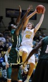 Valparaiso University's Ryan Broekhoff shoots over Chicago State's Nate Henry