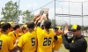 Marian Catholic players celebrate their 4-0 win